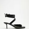 AERE Asymmetrical Toe Post Wrap Heels Black Leather